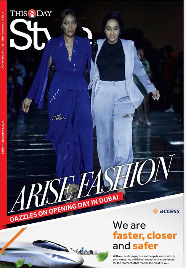 Magazine cover featuring Naomi Campbell and Ruddy in fashionable outfits on a runway, titled 'Arise Fashion dazzles on opening day in Dubai'.