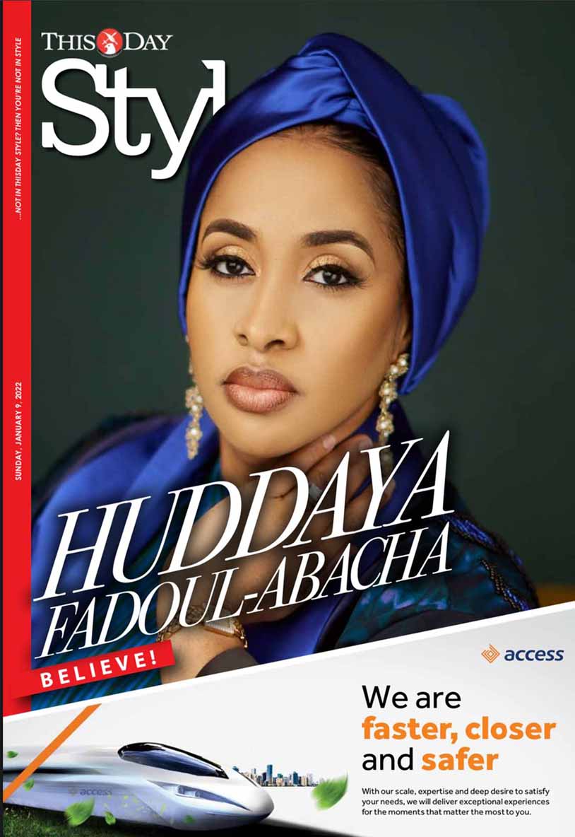 Magazine cover featuring Huddaya Fadoul-Abacha wearing a blue headwrap and earrings, with text highlighting 'We are faster, closer and safer.'